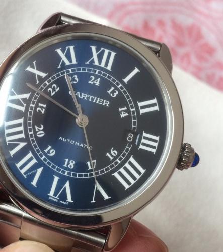 The stainless steel copy Rotonde De Cartier WSRN0023 watches have blue dials.